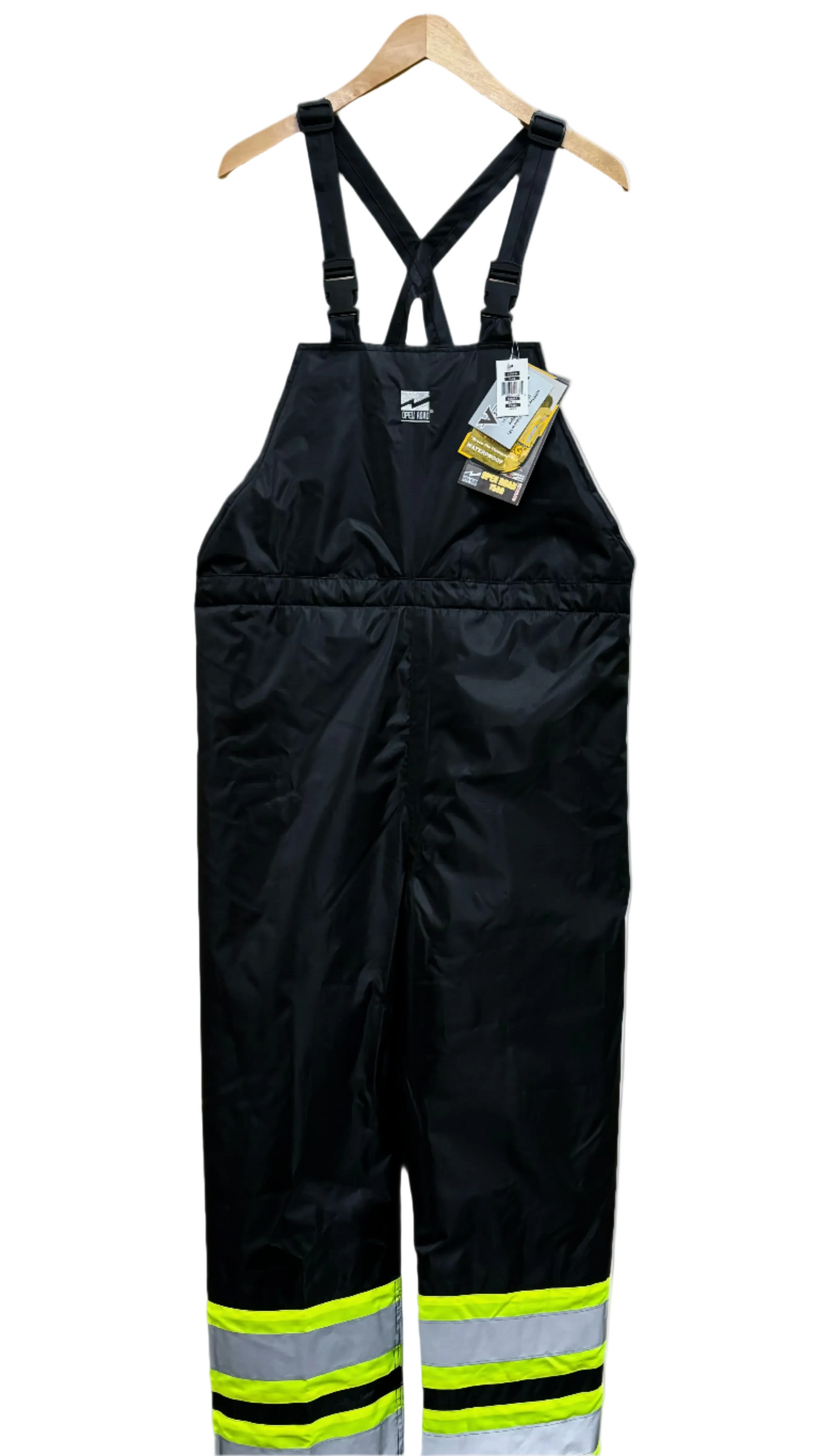 Black bib overalls with reflective stripes on a white background