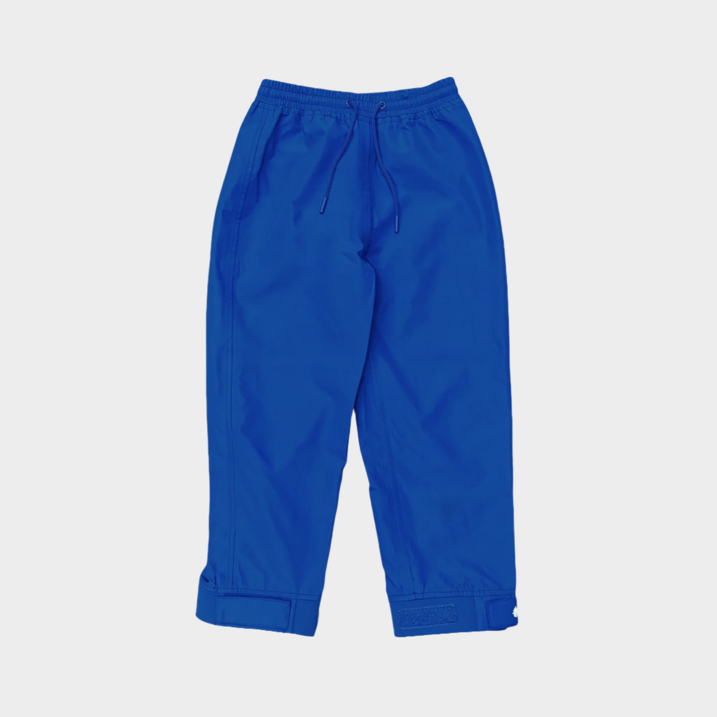 A pair of kids rain pants with an elastic waistband and drawstring. Ankles have a neoprene covered velcro adjustment. Shown in navy