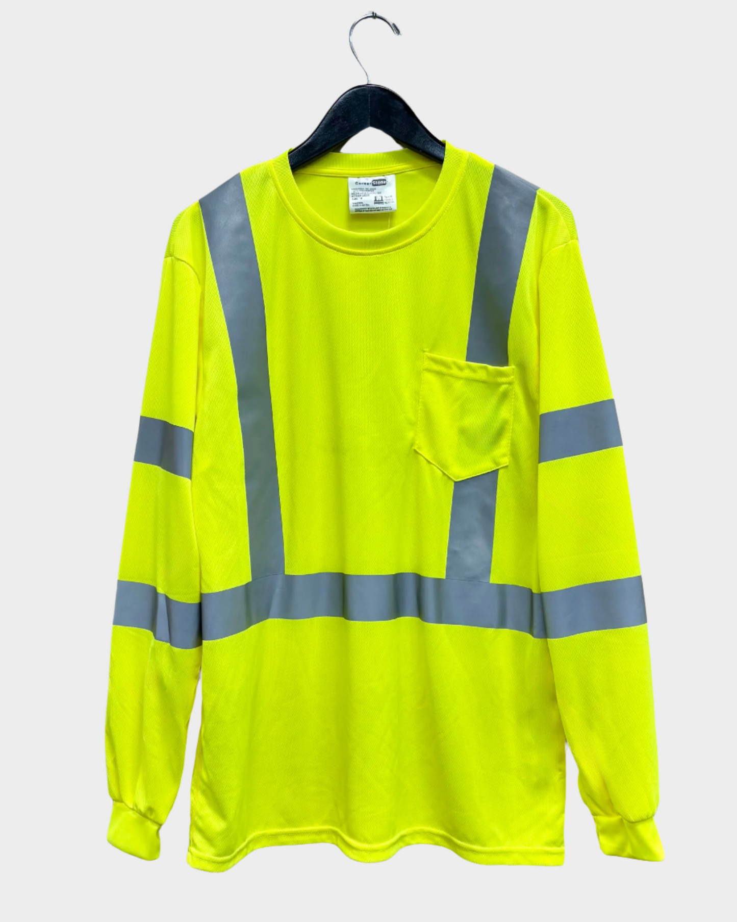 A long sleeve yellow t-shirt with reflective tape on the chest and sleeves, featuring a pocket on the chest area.