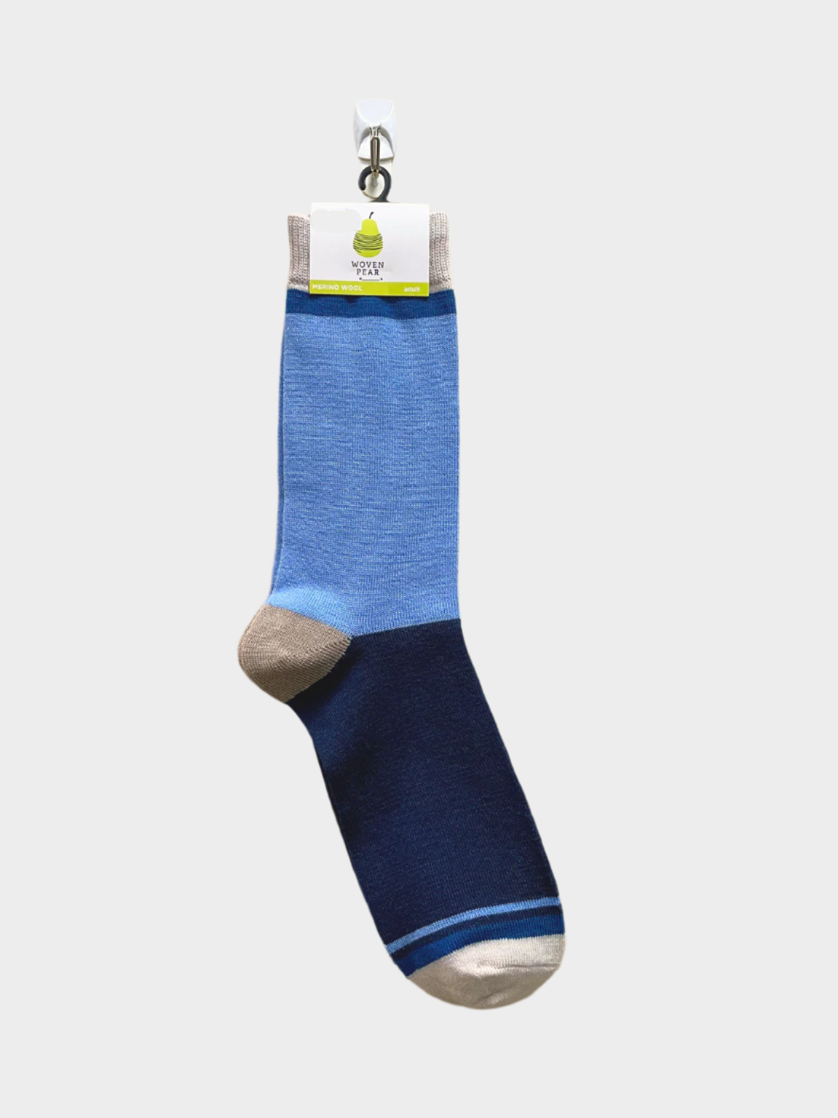 A pair of adult crew length socks with a striped pattern in green and gray, hanging on a wooden hanger.