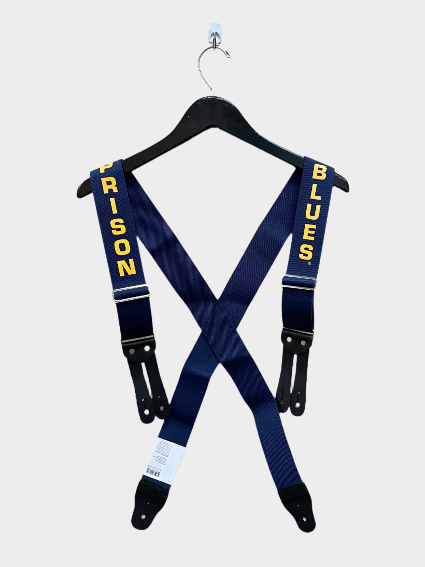 X back navy blue suspenders with yellow lettering and Leather holes for buttons