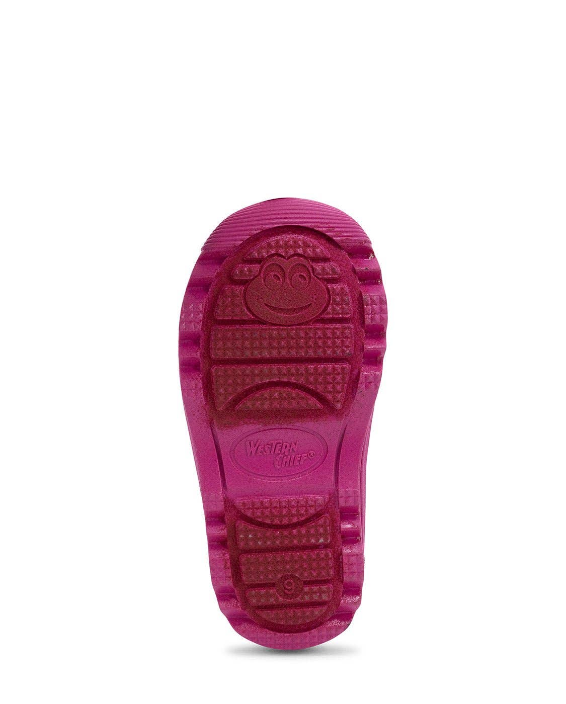 Pink rubber sole of a shoe on a white background