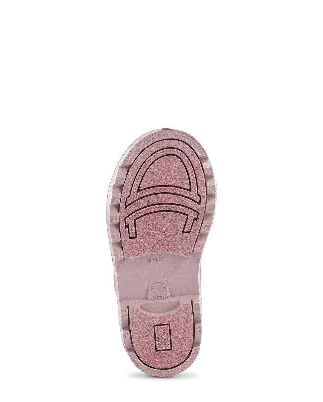 Pink shoe sole on a white background