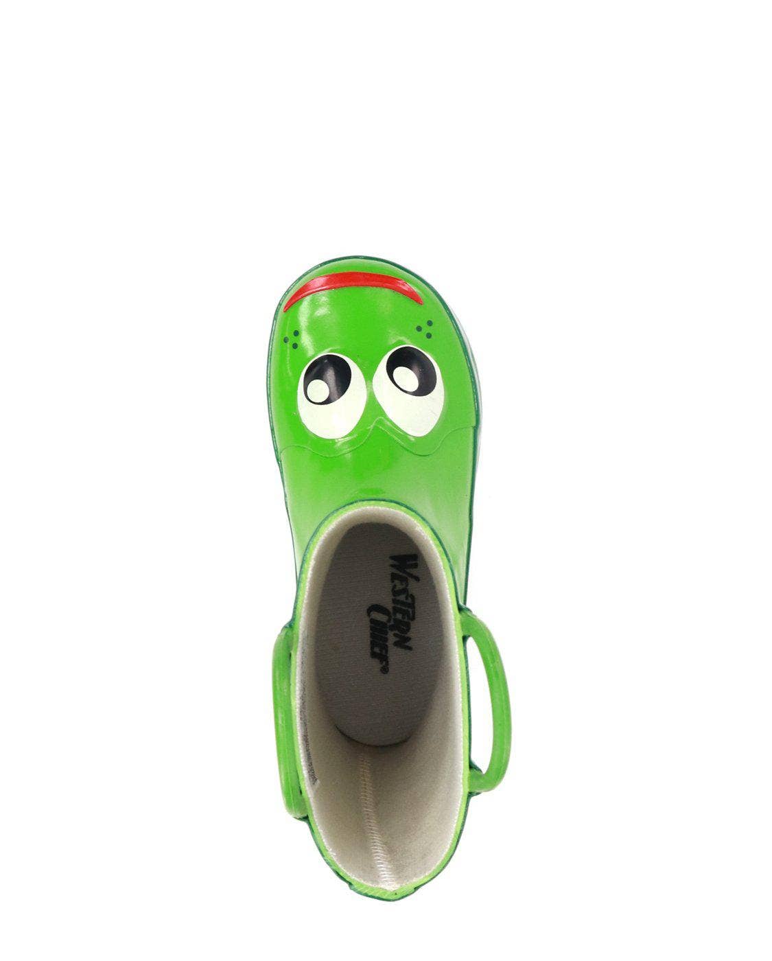Green clog shoe with googly eyes on a white background