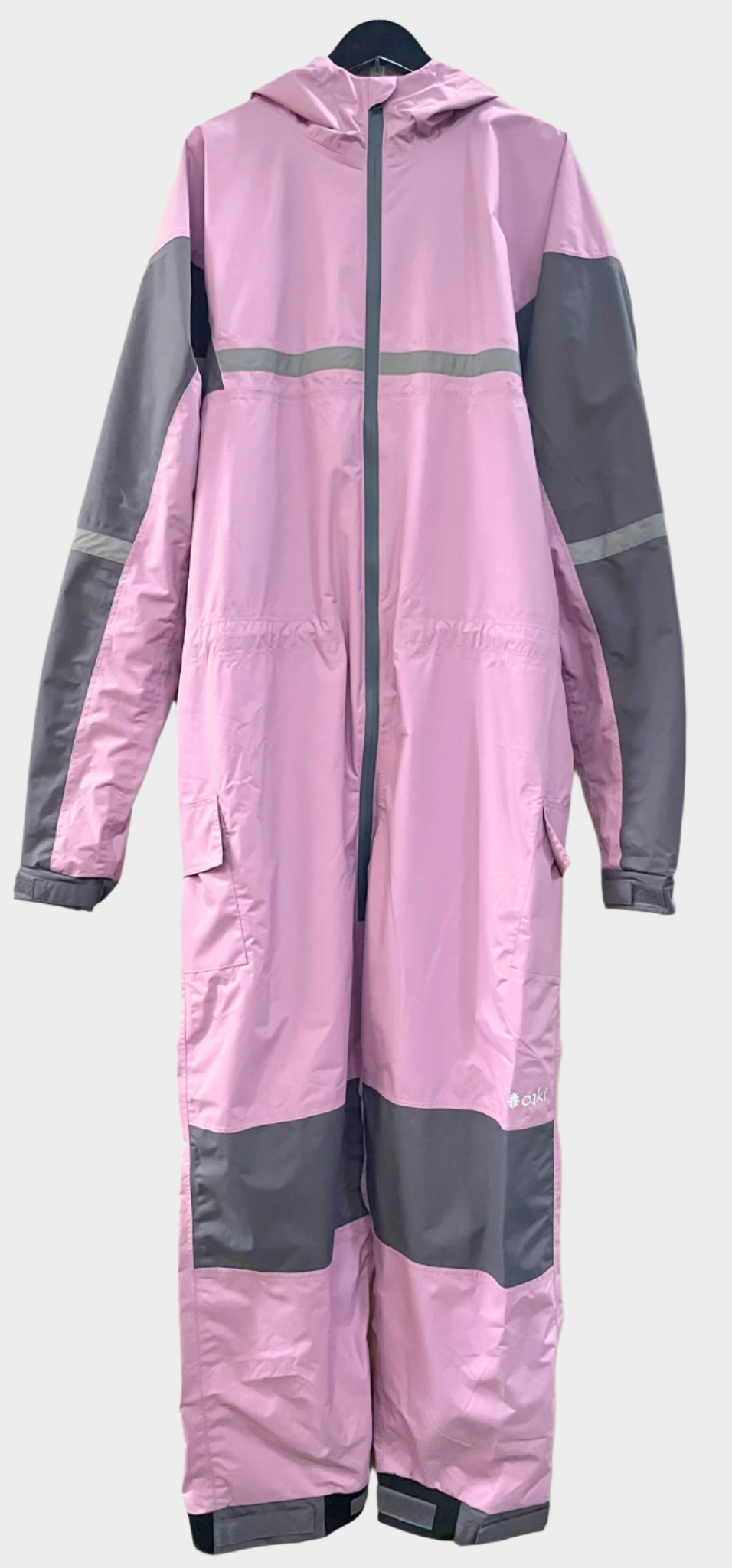 Adult size rain suit in pink, grey on arms and knees. Zipper goes past the waist. Reflective strip across chest. One pocket on each side, adjustable cuffs and waist and hood.