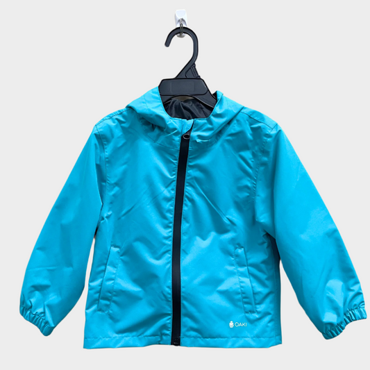 Kids rain shell with hood and a front pocket each side. Shown in glacier blue