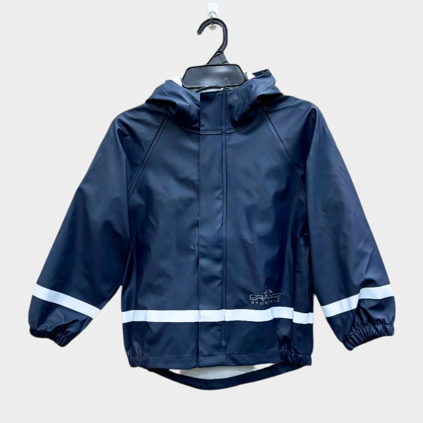 kids solid dark blue PU rain jacket with hood and with reflective strip across wrists and bottom seam. Storm flap over zipper. Elastic waist and wrists. 