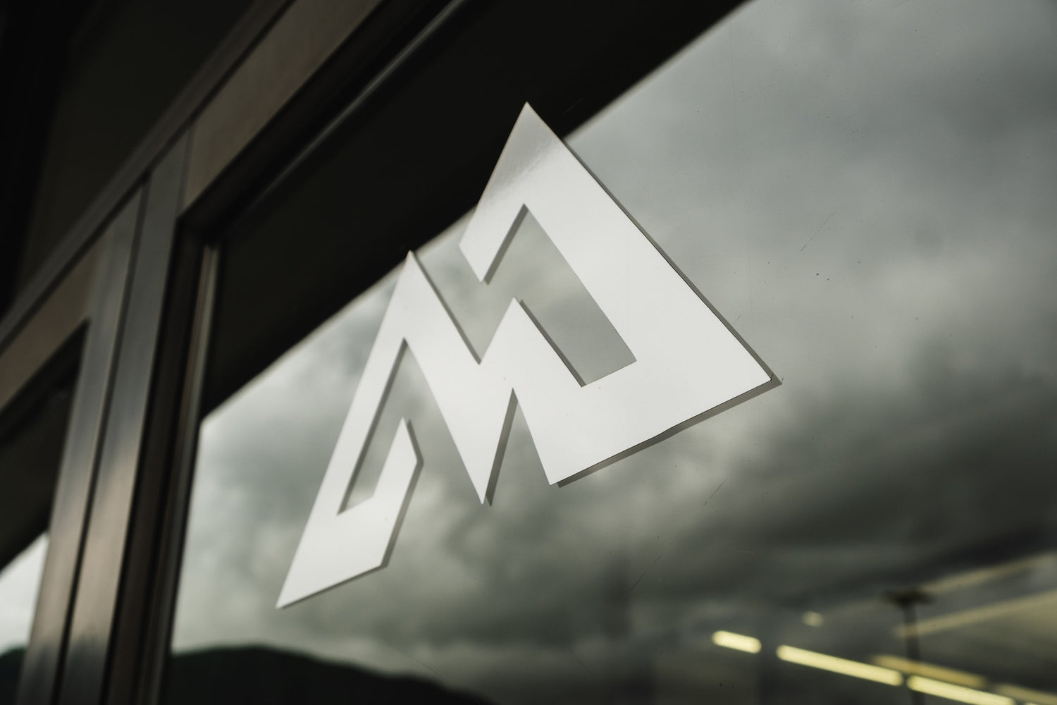 Mendenhall Mall logo print on glass door