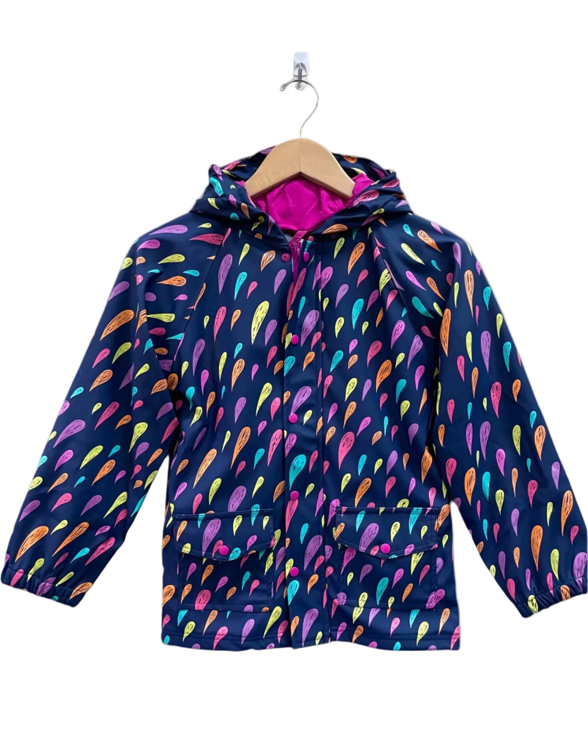 Kids lined rain coat, attached hood, and pockets. Shown in colorful rain drops and dark purple background on coat.