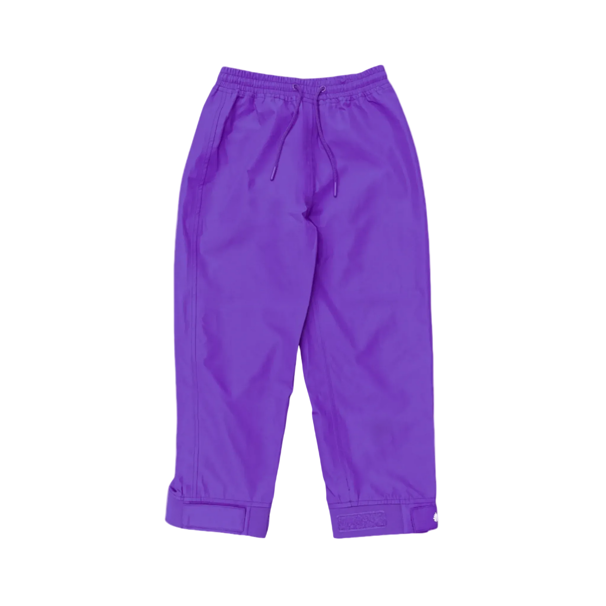 A pair of kids rain pants with an elastic waistband and drawstring. Ankles have a neoprene covered velcro adjustment. Shown in solid purple