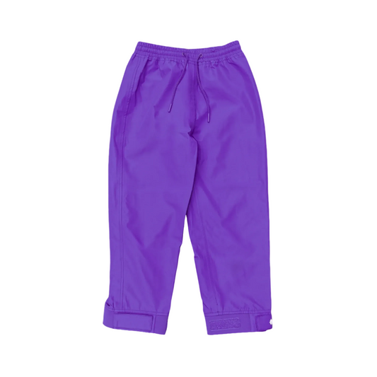A pair of kids rain pants with an elastic waistband and drawstring. Ankles have a neoprene covered velcro adjustment. Shown in solid purple