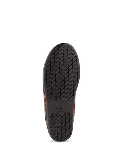 Black sole of a shoe with tread pattern on a white background