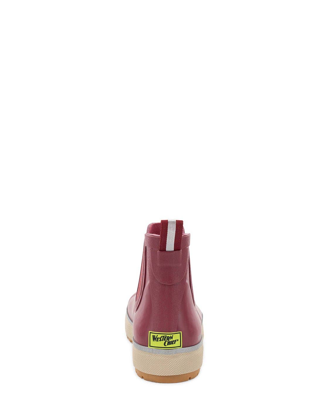 Red rain boot with a visible brand label on a white background