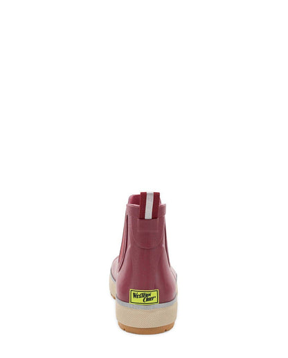 Red rain boot with a visible brand label on a white background