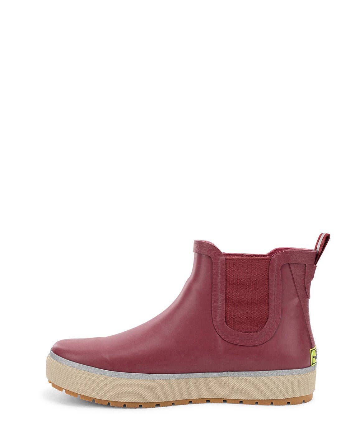 Red rain boot with beige sole on a white background