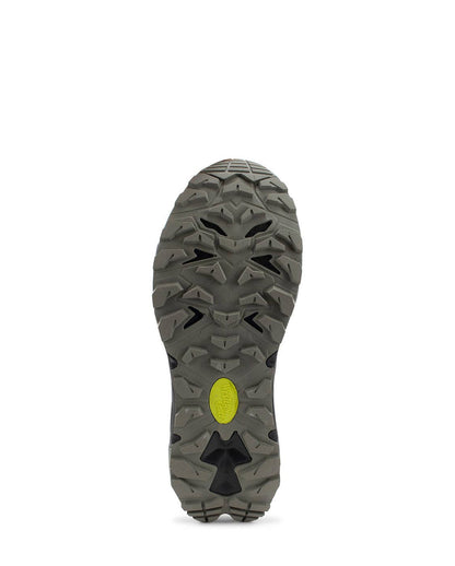 Close-up of a gray shoe sole with a yellow label on a white background