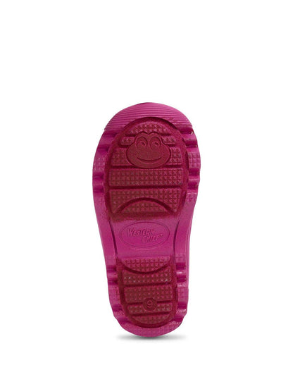 Pink rubber sole of a shoe on a white background