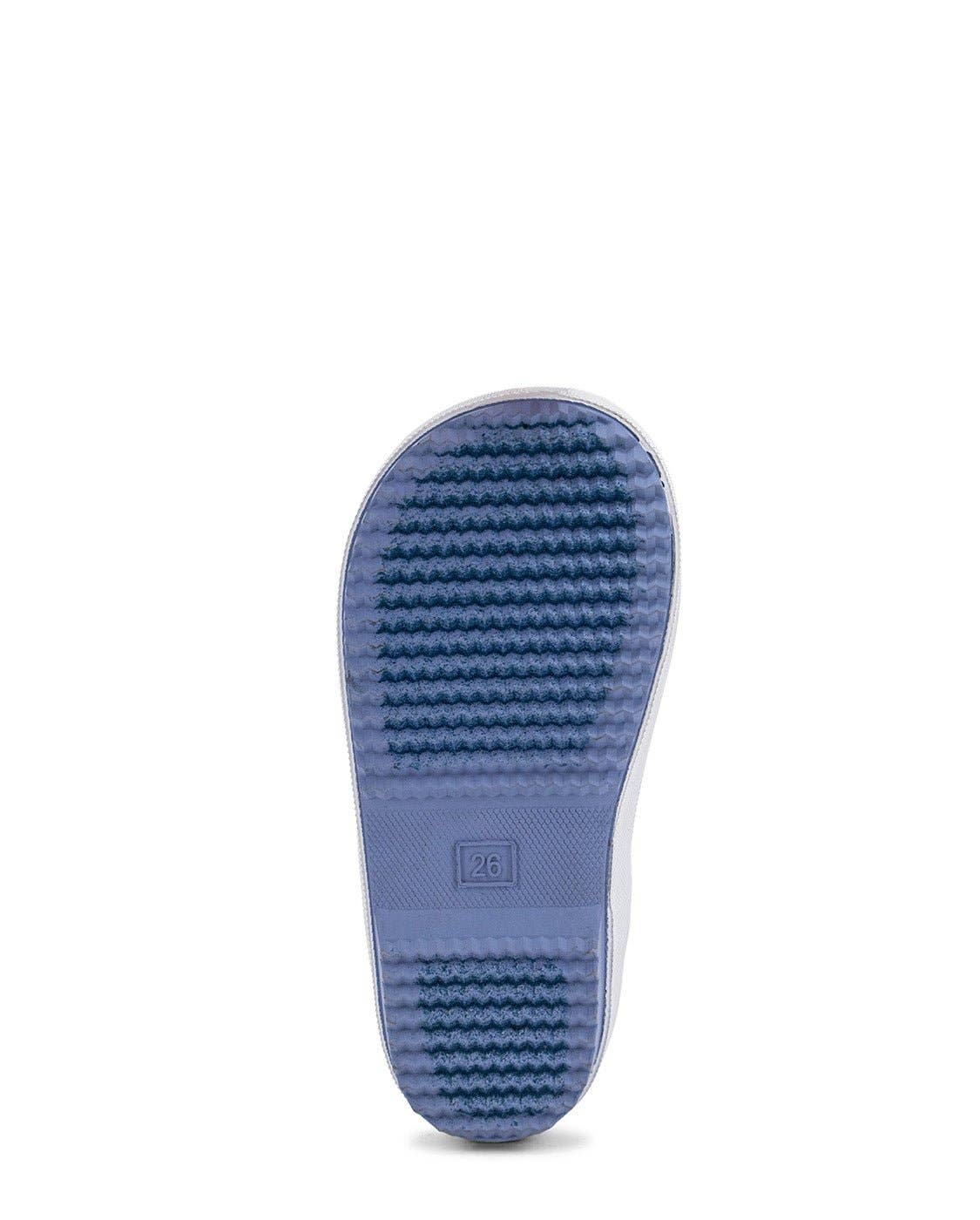 Blue sole of a shoe on a white background