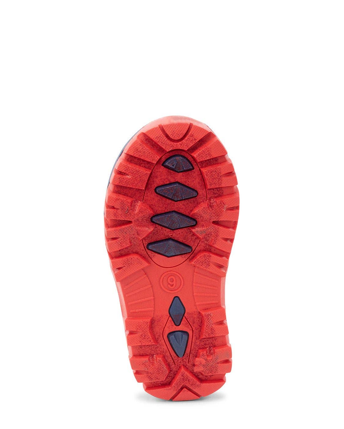 Red shoe sole with textured pattern on a white background